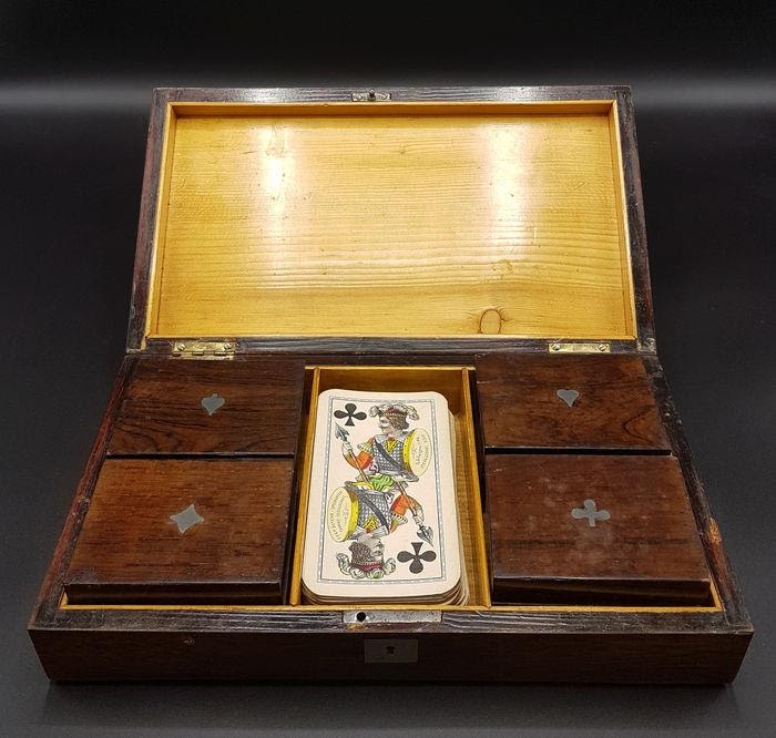 wooden chest with cards